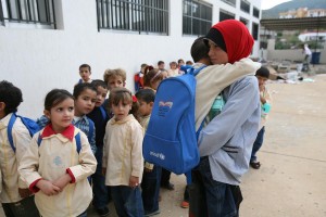 Children line up at a charity supported school in Cairo (File photo) AFP PHOTOS