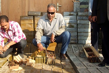 Security forces display some of the ammunition seized in the Suez governorate. (DNE / Hassan Ghonema)