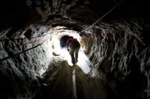 The Egyptian army found three rolls of fabric used to make army uniforms and two rolls for police uniforms in a tunnel between Sinai and Gaza  (AFP Photo)