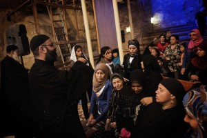 Coptic priests spray worshippers with holy water during a function on April 25, 2013 at the St Samaans (Simon) Church also known as the Cave Church in the Mokattam village, nicknamed "Garbage City," in Cairo. The Egyptian Christian Coptic community will celebrate Easter on May 5.  (AFP Photo)